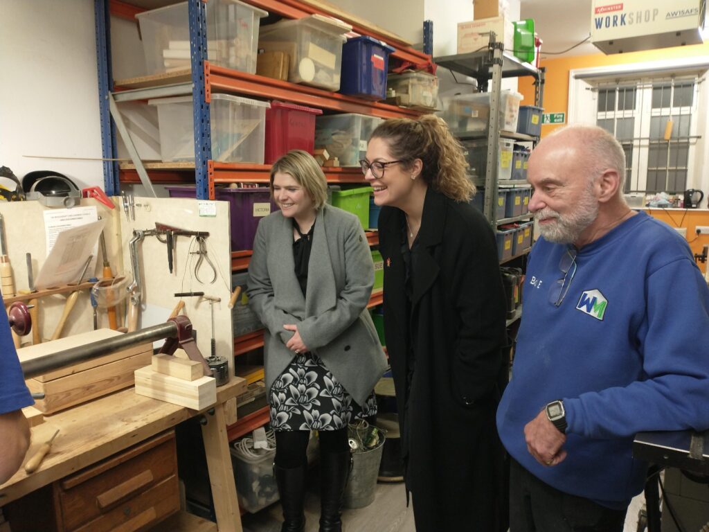 Bob M gave a short demonstration of wood turning on the lathe watched by an attentive Bob Emblin